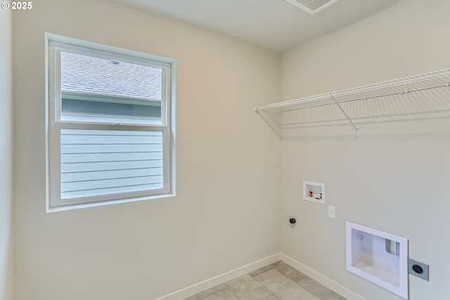 laundry room featuring hookup for a washing machine, visible vents, electric dryer hookup, laundry area, and baseboards