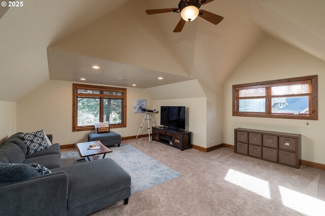 living room with recessed lighting, light carpet, vaulted ceiling, and baseboards