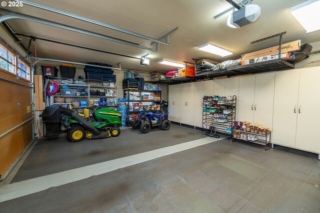 garage featuring a garage door opener