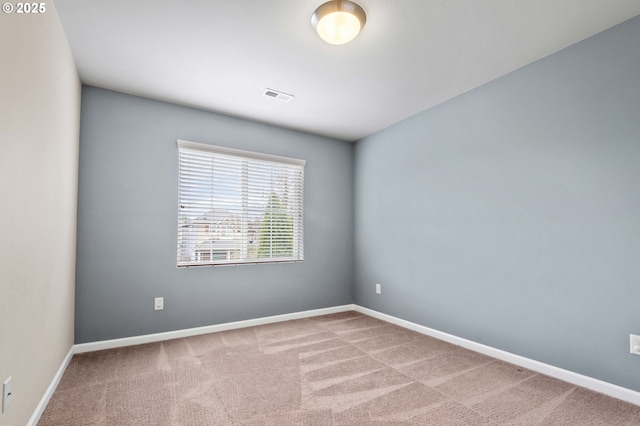 3962 SE Discovery St, Hillsboro, OR 97123 - carpeted spare room featuring visible vents and baseboards