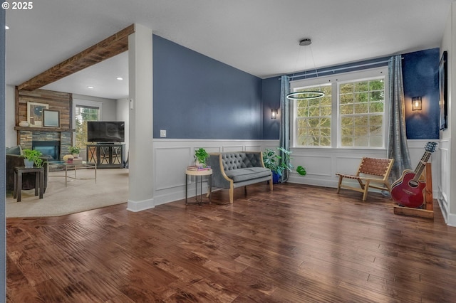 14411 SW 128th Pl, Tigard, OR 97224 - sitting room featuring a fireplace, wainscoting, and wood finished floors