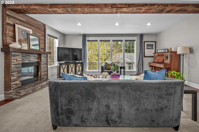 14411 SW 128th Pl, Tigard, OR 97224 - carpeted living area with a glass covered fireplace, recessed lighting, and baseboards