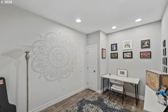 office with recessed lighting, wood finished floors, and baseboards