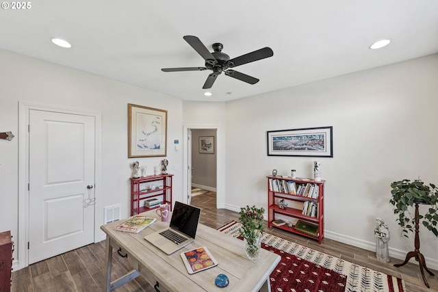 office featuring baseboards, dark wood-type flooring, and recessed lighting