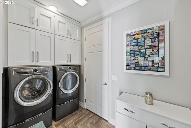 3220 Natalie Way, Bandon, OR 97411 - laundry room featuring washer and dryer, cabinet space, and ornamental molding