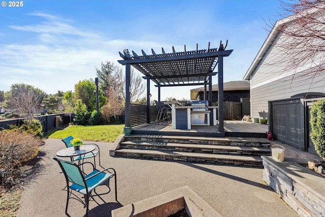 view of patio / terrace with a deck, a fenced backyard, and a pergola