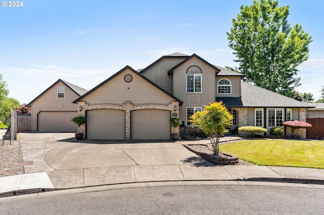 3644 Fall Creek Ct, Keizer, OR 97303 - traditional-style house with a garage, concrete driveway, roof with shingles, and brick siding