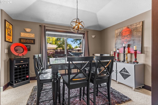 3644 Fall Creek Ct, Keizer, OR 97303 - carpeted dining space with a chandelier, baseboards, and a textured ceiling