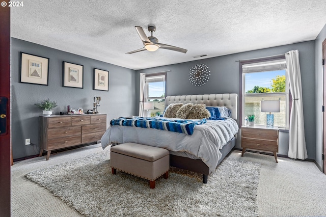 3644 Fall Creek Ct, Keizer, OR 97303 - bedroom featuring carpet flooring, a ceiling fan, a textured ceiling, and baseboards