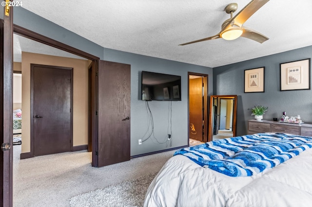 3644 Fall Creek Ct, Keizer, OR 97303 - bedroom featuring a textured ceiling, carpet floors, a ceiling fan, and baseboards