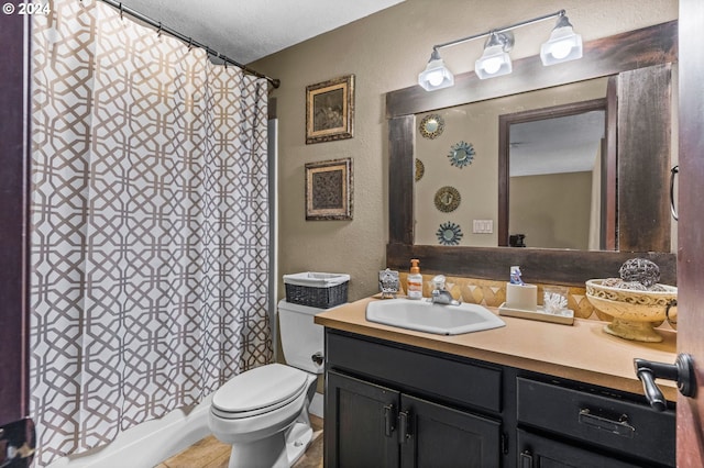 3644 Fall Creek Ct, Keizer, OR 97303 - bathroom featuring vanity, toilet, a textured wall, a textured ceiling, and shower / bathtub combination with curtain