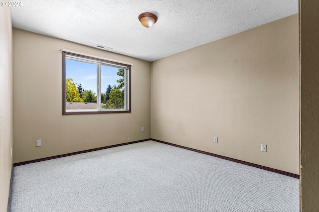 3644 Fall Creek Ct, Keizer, OR 97303 - carpeted empty room with a textured ceiling and baseboards