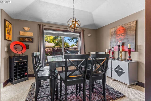 3644 Fall Creek Ct, Keizer, OR 97303 - carpeted dining space with a chandelier, baseboards, and a textured ceiling