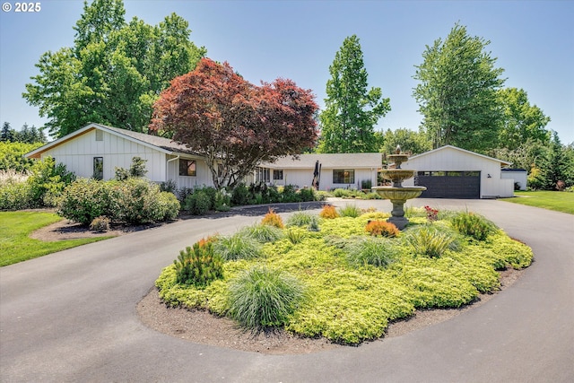 11700 S Makin Ln, Canby, OR 97013 - ranch-style house with board and batten siding and a garage