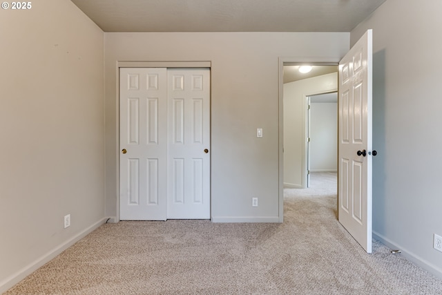 3980 Century Dr, Eugene, OR 97402 - unfurnished bedroom featuring light colored carpet and a closet