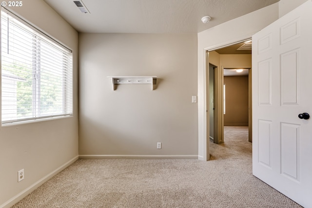 3980 Century Dr, Eugene, OR 97402 - unfurnished room with carpet, plenty of natural light, and a smoke detector
