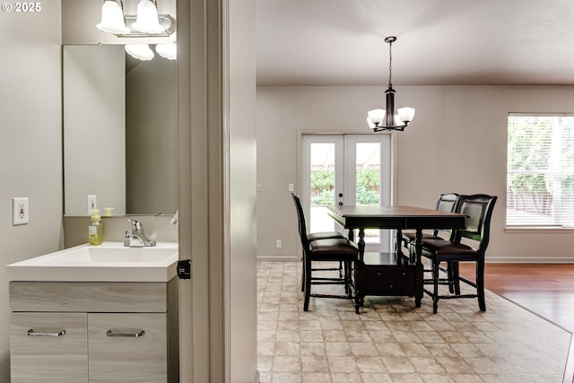 3980 Century Dr, Eugene, OR 97402 - dining room featuring a chandelier, plenty of natural light, and french doors