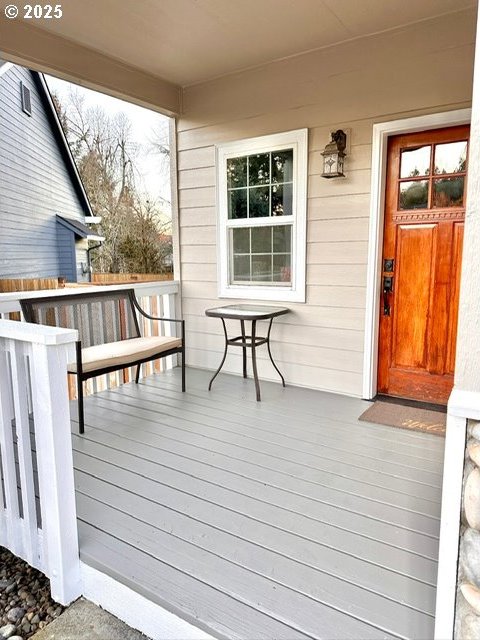 deck featuring covered porch