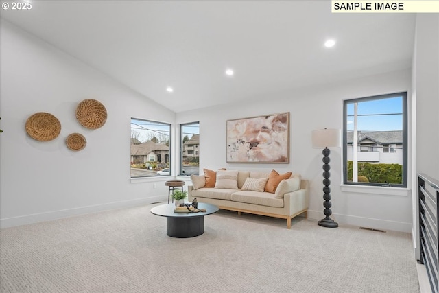 carpeted living room with recessed lighting, plenty of natural light, baseboards, and vaulted ceiling