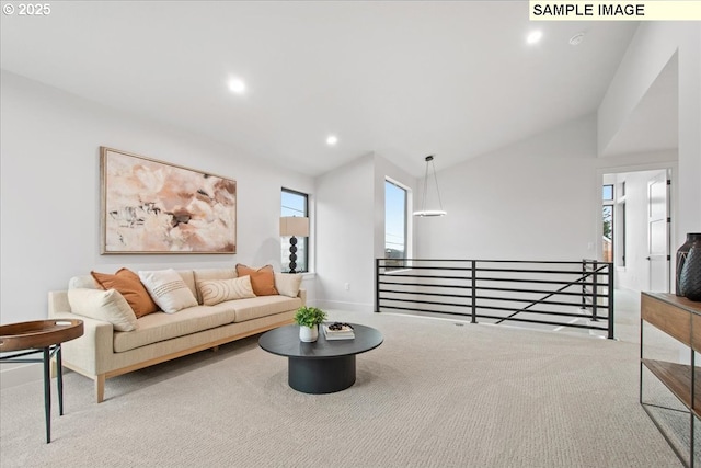 carpeted living room featuring recessed lighting, baseboards, and lofted ceiling