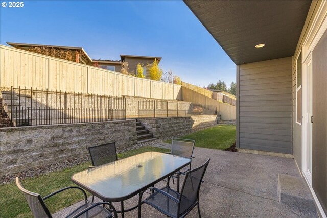 exterior space with a lawn and a patio