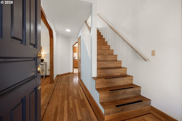 8156 SW 159th Pl, Beaverton, OR 97007 - stairway with baseboards, wood finished floors, and recessed lighting