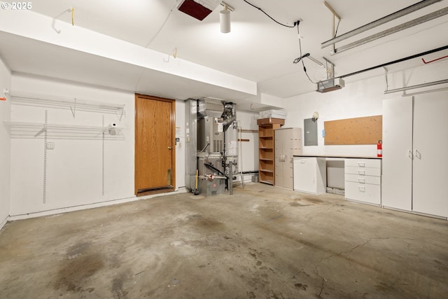 8156 SW 159th Pl, Beaverton, OR 97007 - garage featuring electric panel and a garage door opener