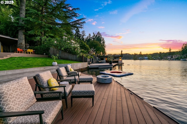 1115 Lake Front Rd, Lake Oswego, OR 97034 - deck at dusk with a water view, a boat dock, and a yard