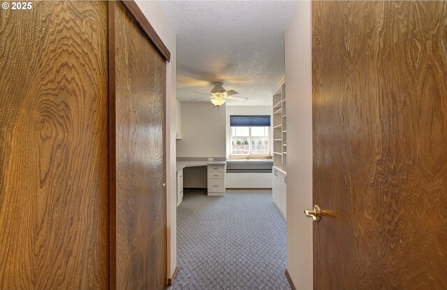 15798 SE 15th St, Vancouver, WA 98683 - hall with carpet floors, a textured ceiling, and a desk