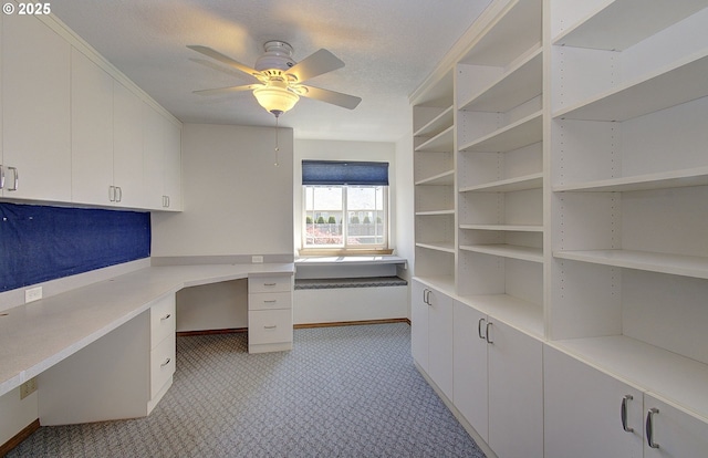 15798 SE 15th St, Vancouver, WA 98683 - unfurnished office featuring built in desk, a ceiling fan, light colored carpet, and baseboards