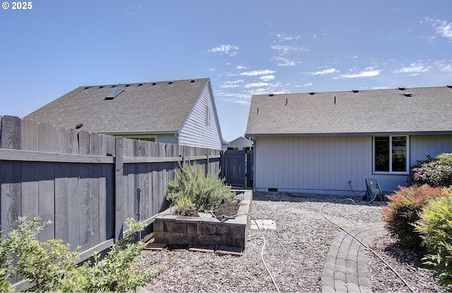 15798 SE 15th St, Vancouver, WA 98683 - view of home's exterior featuring a shingled roof and crawl space