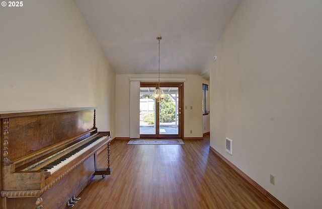 15798 SE 15th St, Vancouver, WA 98683 - foyer with baseboards, wood finished floors, and lofted ceiling