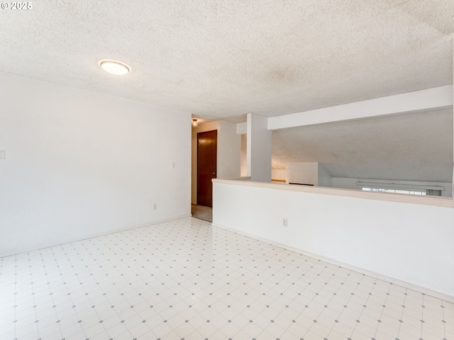 20621 SW Martinazzi Ave, Tualatin, OR 97062 - empty room with light floors and a textured ceiling