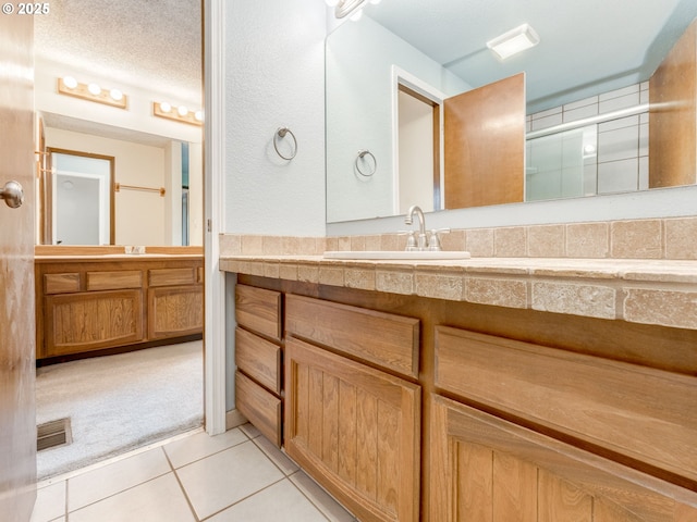 20621 SW Martinazzi Ave, Tualatin, OR 97062 - full bath with vanity, tile patterned flooring, and an enclosed shower
