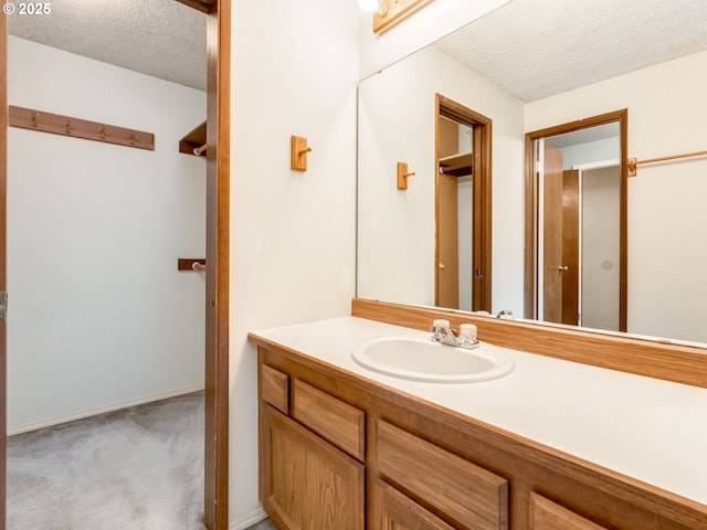 20621 SW Martinazzi Ave, Tualatin, OR 97062 - bathroom with a textured ceiling and vanity