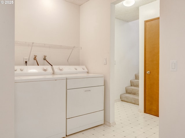 20621 SW Martinazzi Ave, Tualatin, OR 97062 - laundry room featuring washing machine and dryer, light flooring, and a textured ceiling