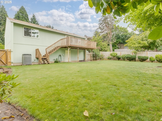 20621 SW Martinazzi Ave, Tualatin, OR 97062 - back of house with stairs, a wooden deck, and central AC unit