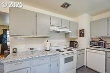 2237 SE 189th Ave, Portland, OR 97233 - kitchen with white appliances, gray cabinets, under cabinet range hood, and light countertops