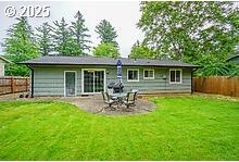 2237 SE 189th Ave, Portland, OR 97233 - back of house featuring a patio area