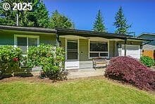 2237 SE 189th Ave, Portland, OR 97233 - view of front of home with a front lawn