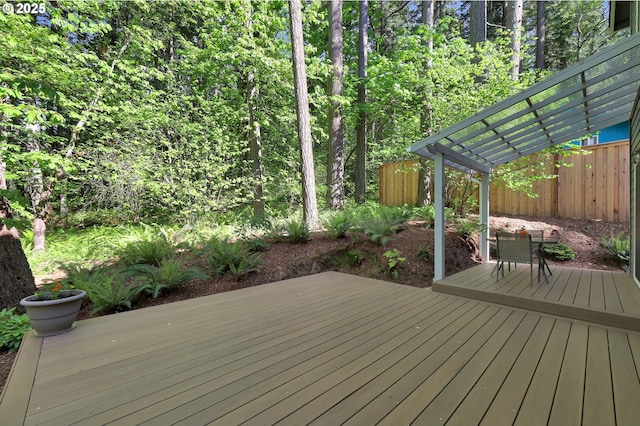 wooden deck featuring fence