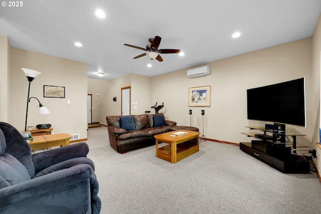 carpeted living room featuring ceiling fan, visible vents, baseboards, an AC wall unit, and recessed lighting