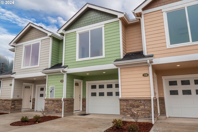 view of front of property with a garage