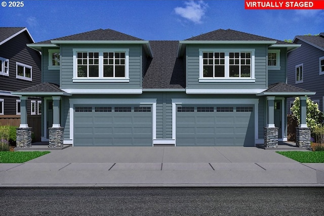 view of front of property featuring a garage