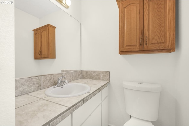 half bath with toilet and vanity