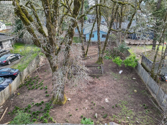 view of yard featuring fence