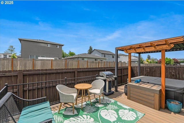 12505 NE 102nd Way, Vancouver, WA 98682 - wooden deck featuring a hot tub, a grill, a pergola, and a fenced backyard