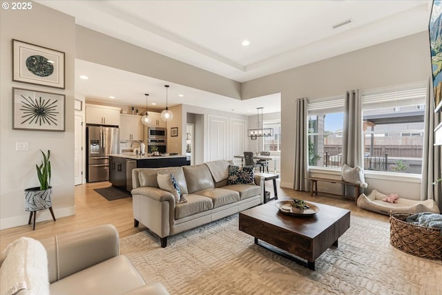 12505 NE 102nd Way, Vancouver, WA 98682 - living area featuring light wood finished floors, recessed lighting, and a chandelier