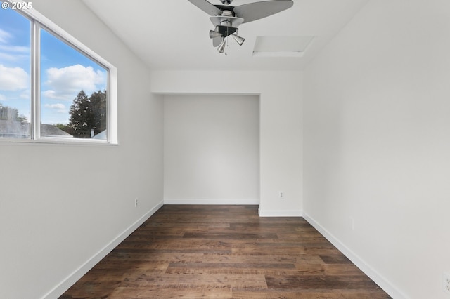 1571 NW Tanasbrook Ct, Beaverton, OR 97006 - unfurnished room with a ceiling fan, dark wood-style floors, and baseboards