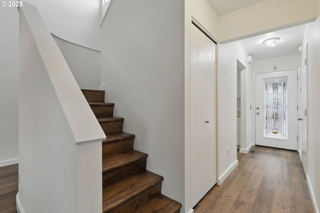 1571 NW Tanasbrook Ct, Beaverton, OR 97006 - stairway featuring wood finished floors and baseboards